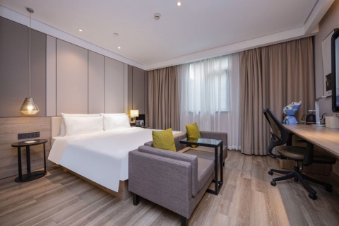 �Ϻ����Ź�չ����·�Ƕ�Ƶ�